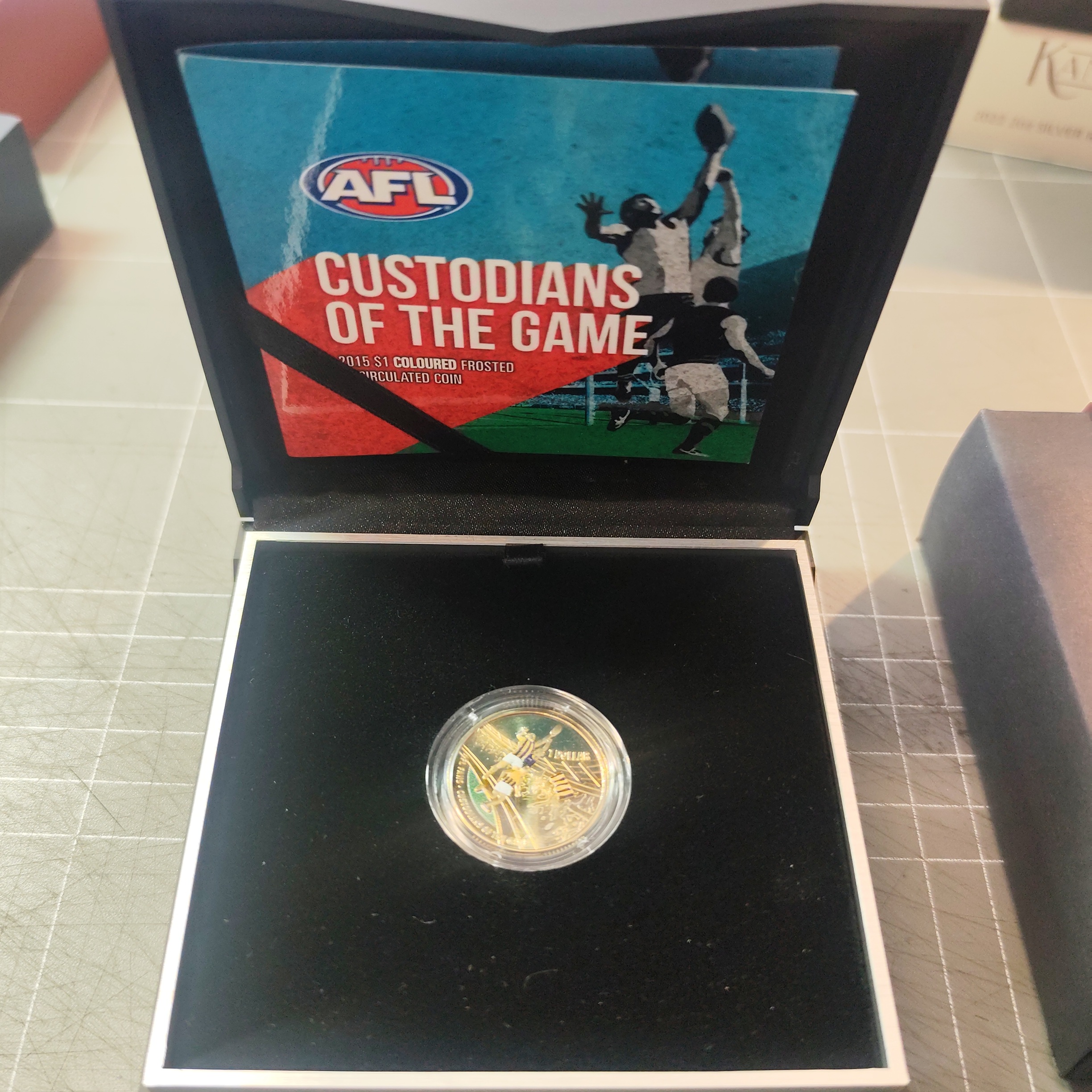 2015 AFL Premiers Hawthorn Hawks Coloured One Dollar Uncirculated - Image 2